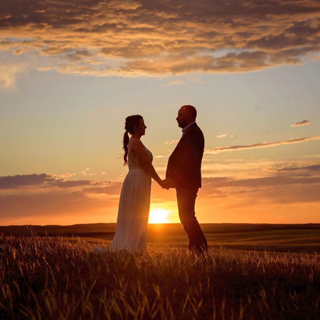 A beautiful sun setting on a Saskatchewan couple in love taken at Val Marie, Saskatchewan.